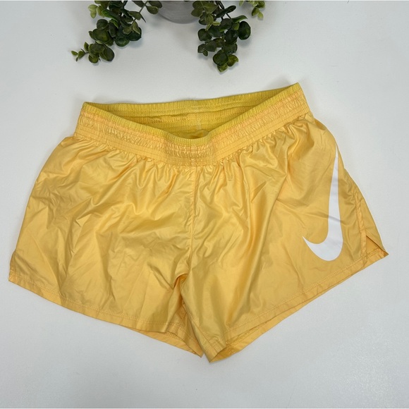 Nike Pants - Nike Womens Running Shorts Buttercream Yellow White Logo Drawstring Size S Small